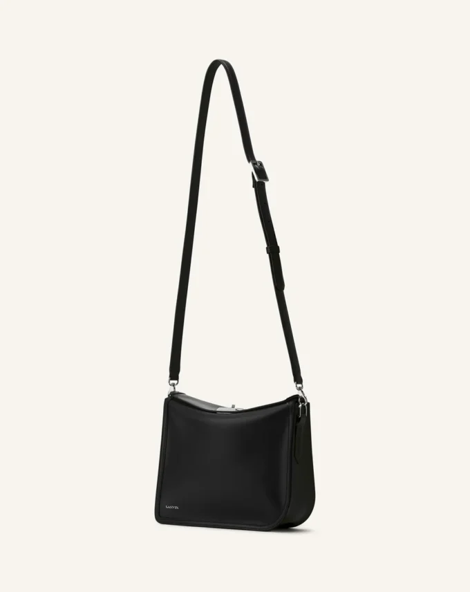 Compagnon Asymmetrisk läderclutch