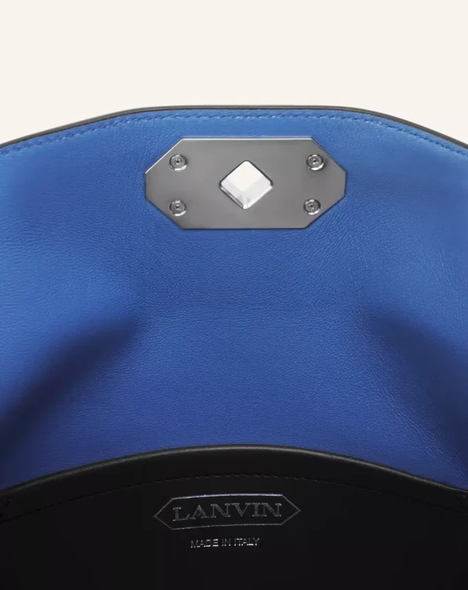 Compagnon Asymmetrisk läderclutch