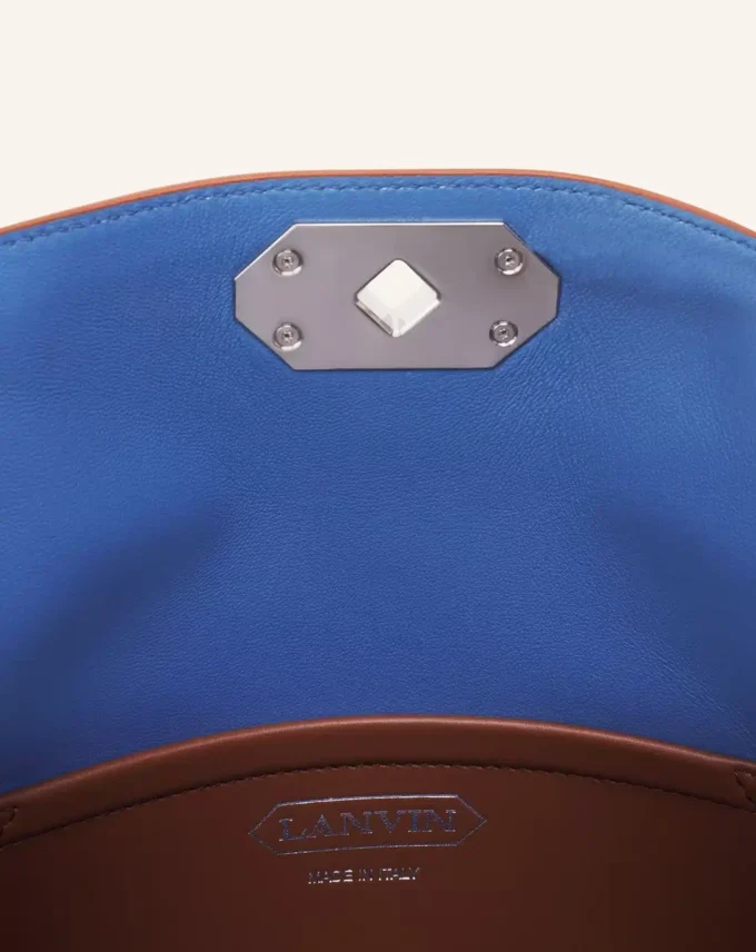 Compagnon Asymmetrisk läderclutch