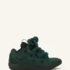 Curb Sneakers i läder med ormskinnssnören Curb Sneakers i läder med ormskinnssnören