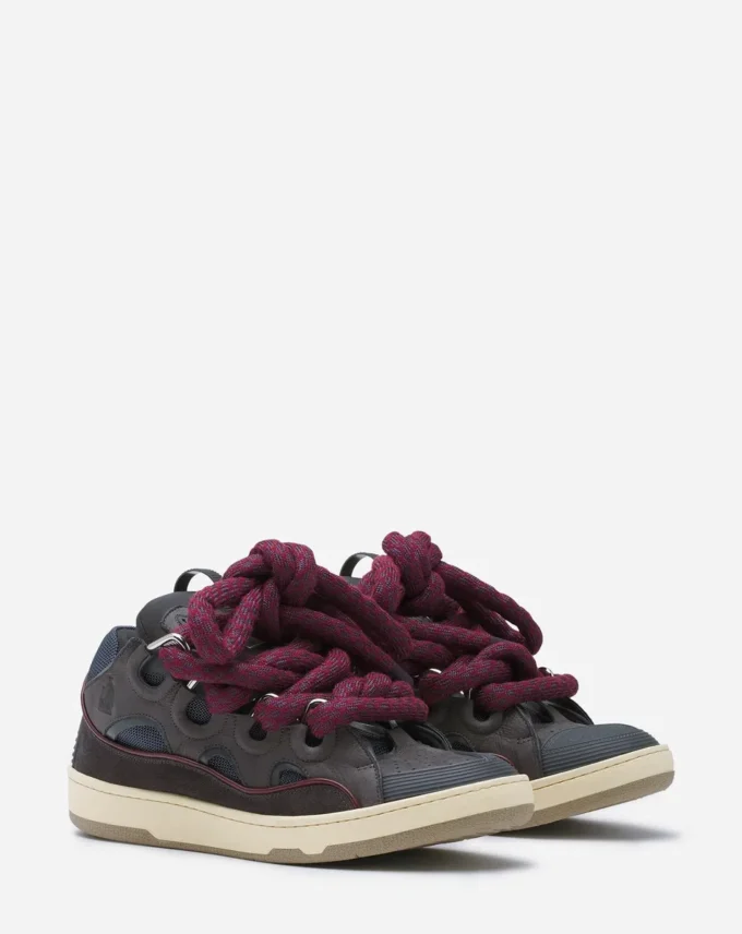 Curb Sneakers i läder med ormskinnssnören
