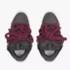 Curb Sneakers i läder med ormskinnssnören