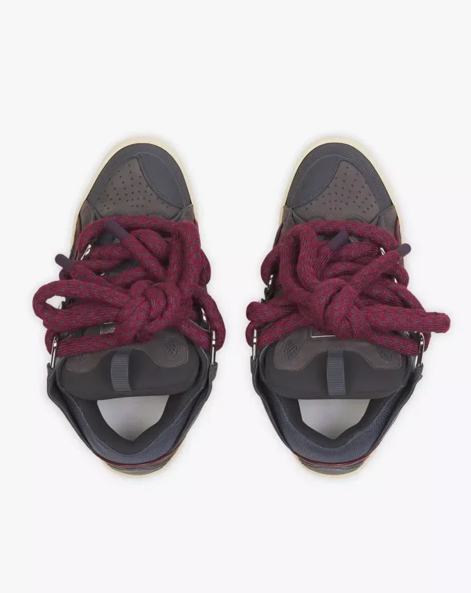 Curb Sneakers i läder med ormskinnssnören