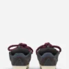 Curb Sneakers i läder med ormskinnssnören