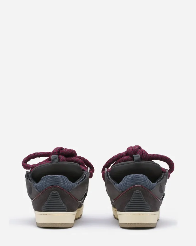 Curb Sneakers i läder med ormskinnssnören