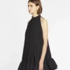 Kort klänning med volanger Kort klänning med volanger