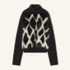 Turtleneck-tröja i ull och läder med intarsia Turtleneck-tröja i ull och läder med intarsia